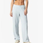 Person wearing Loones Aura trousers on a white background