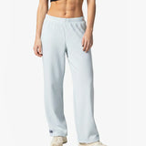 Person wearing Loones Aura trousers on a white background