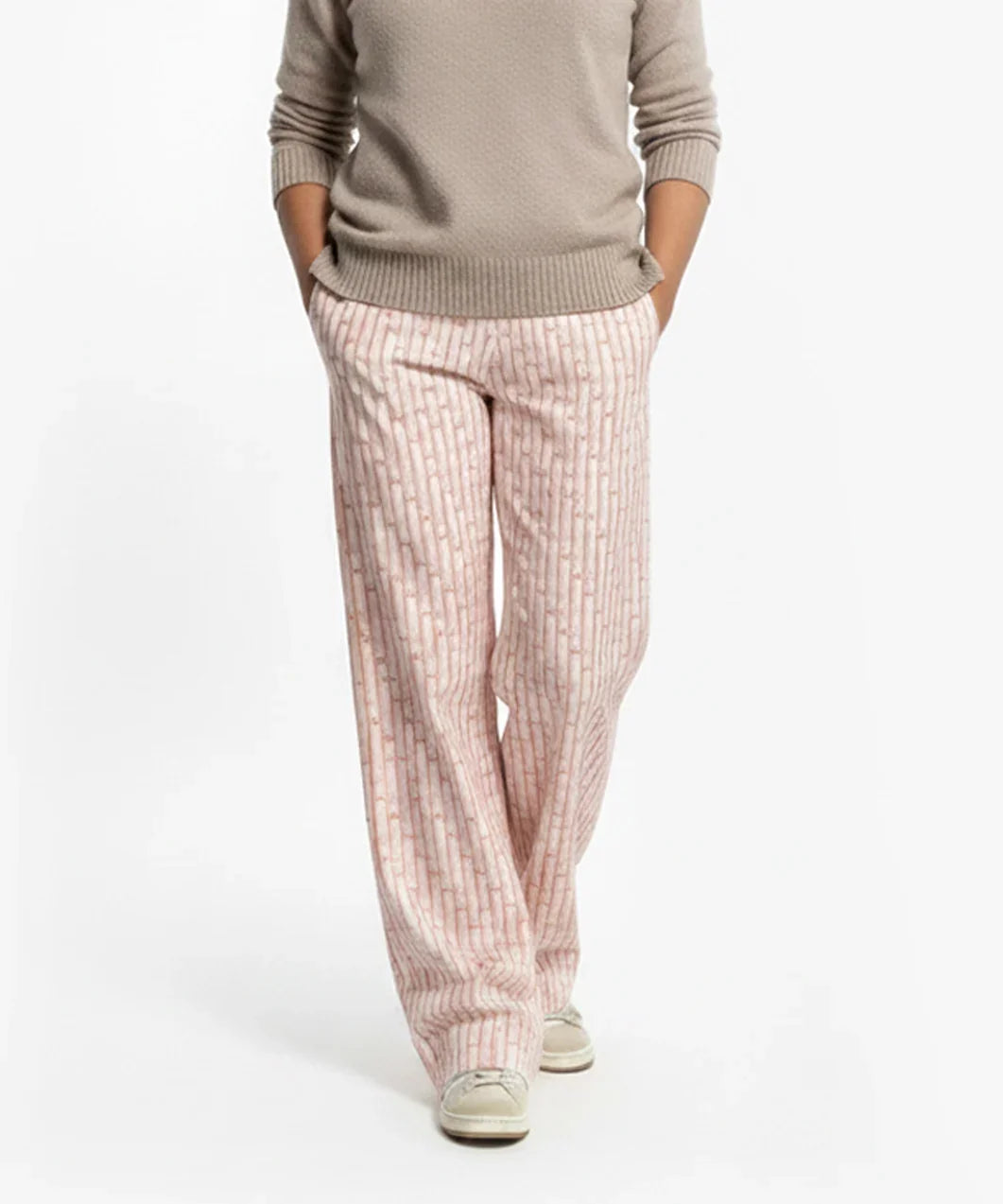 Person wearing Loones coppafeel! trousers on a white background