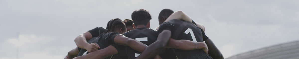 Video of a group of rugby players huddling together for a team talk